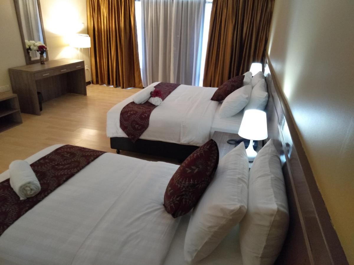 Temu Primula Hotel Kampong Seberang Timor Buitenkant foto