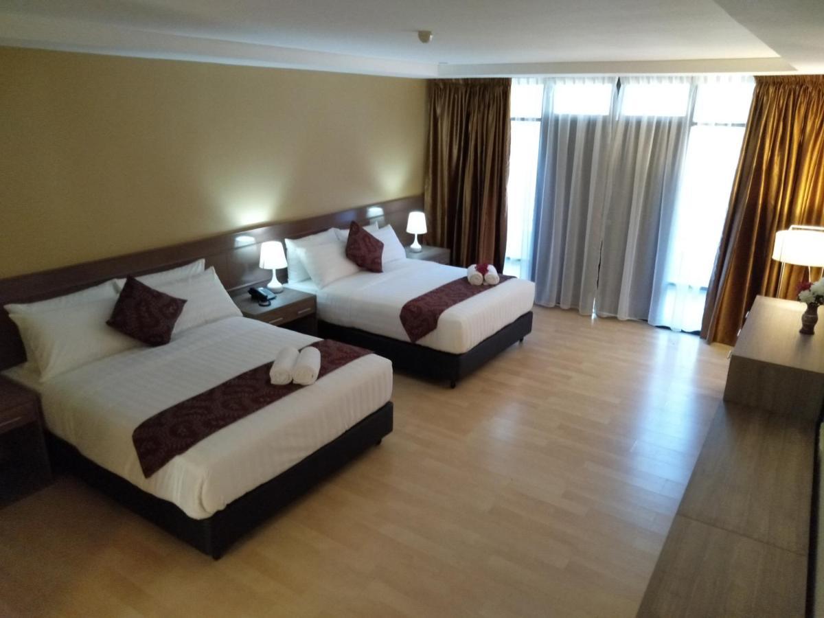 Temu Primula Hotel Kampong Seberang Timor Buitenkant foto