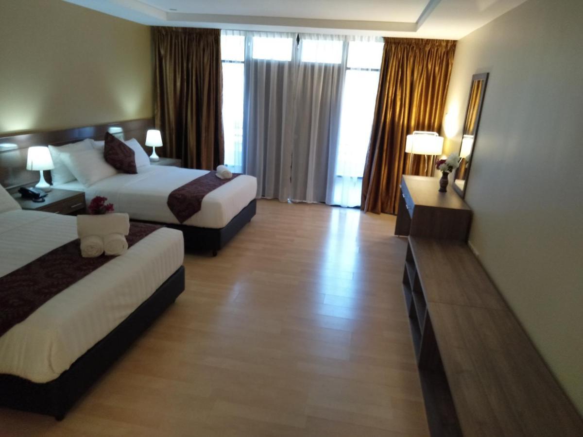 Temu Primula Hotel Kampong Seberang Timor Buitenkant foto